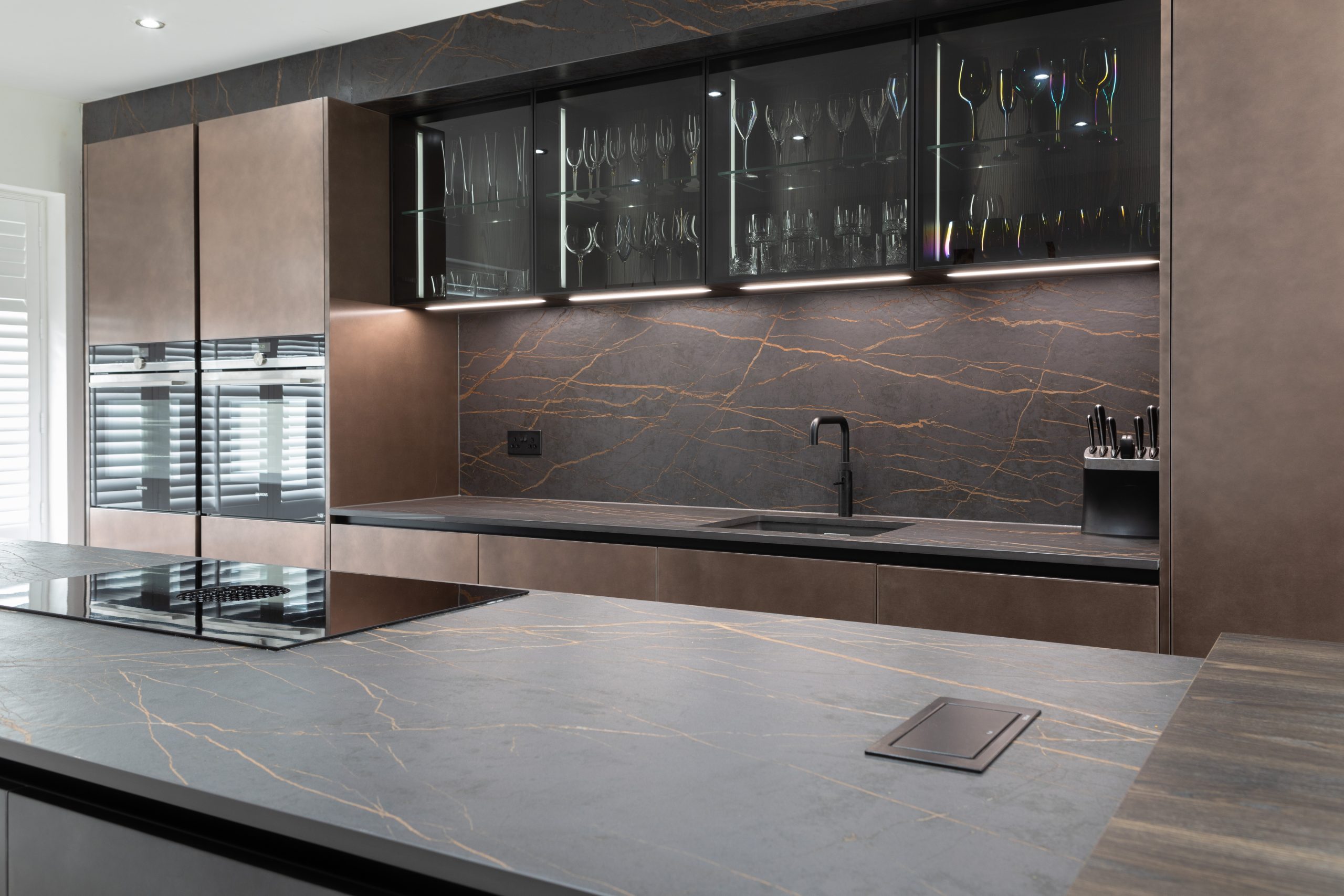 Handleless Carbon Steel & Copper Kitchen With Dekton Laurent Worktops ...