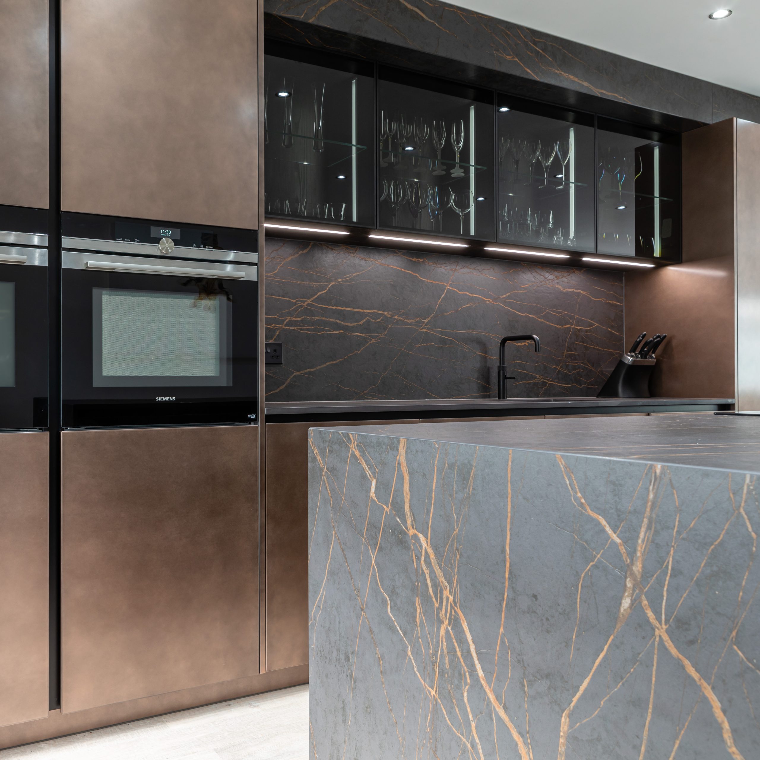 Handleless Carbon Steel & Copper Kitchen With Dekton Laurent Worktops ...