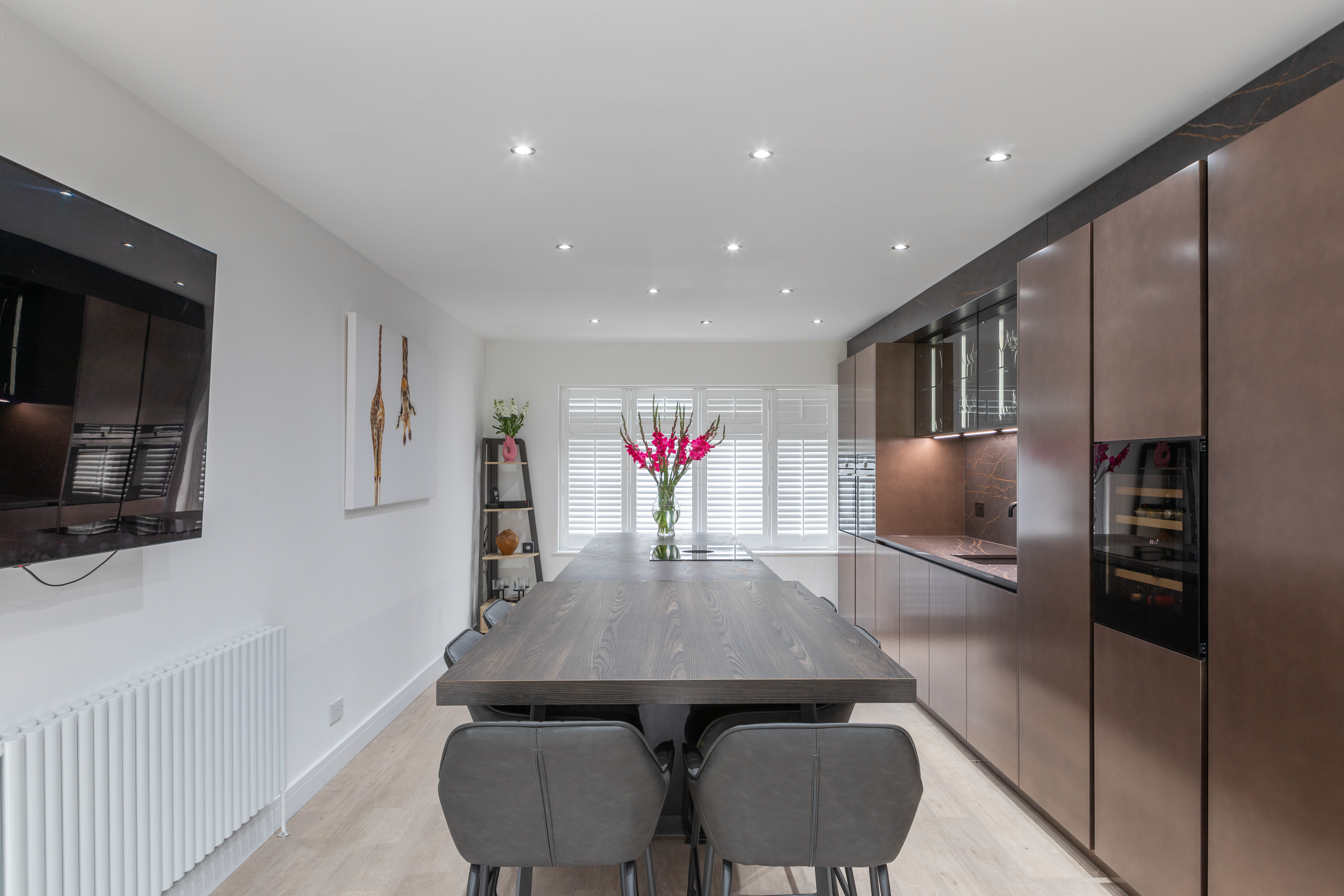 Handleless Carbon Steel & Copper Kitchen With Dekton Laurent Worktops