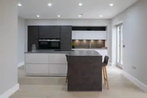 The Benefits of a Kitchen Island and how to make it work for your space Modern Glossy Kitchen With Dark Finish