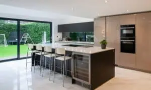 The Benefits of a Kitchen Island and how to make it work for your space Modern Kitchen With Island and Glossy Finish